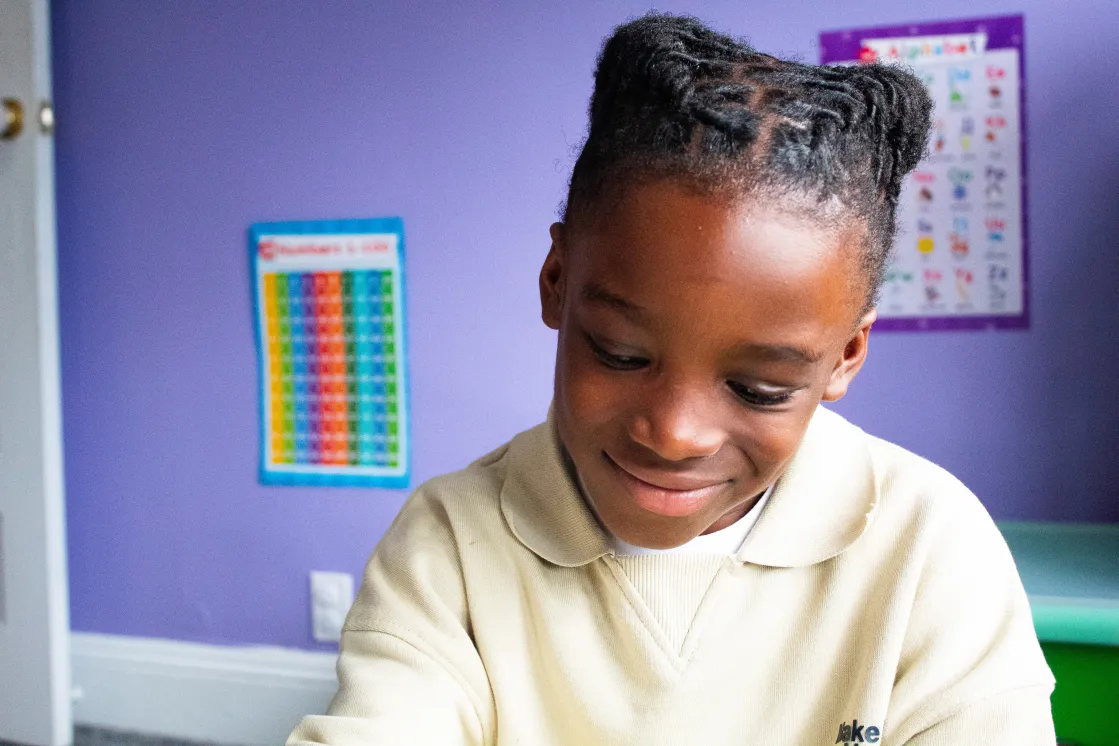 Photo of a girl smiling.